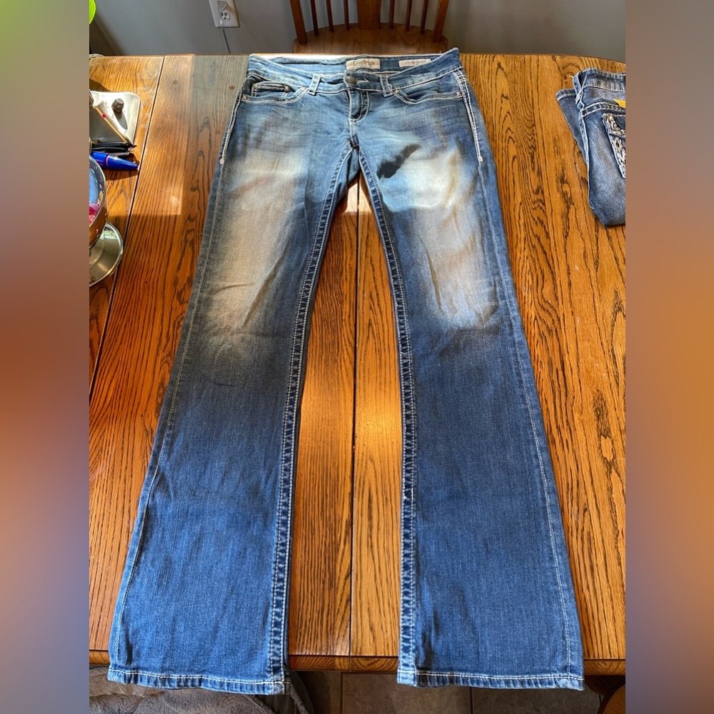 Women’s buckle jeans